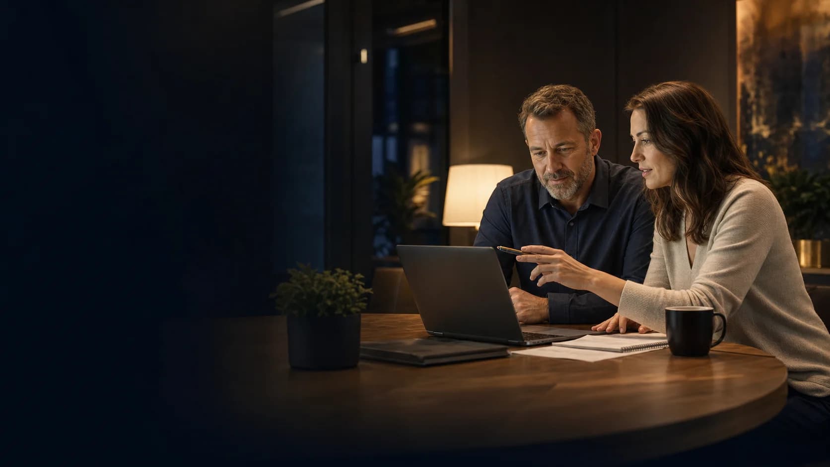 Business owner and consultant reviewing practical AI options together